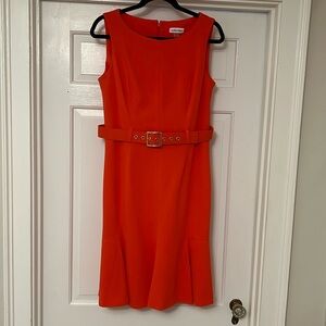 Calvin Klein women’s size 10 sleeveless belted dress. Orange. Zippered back.